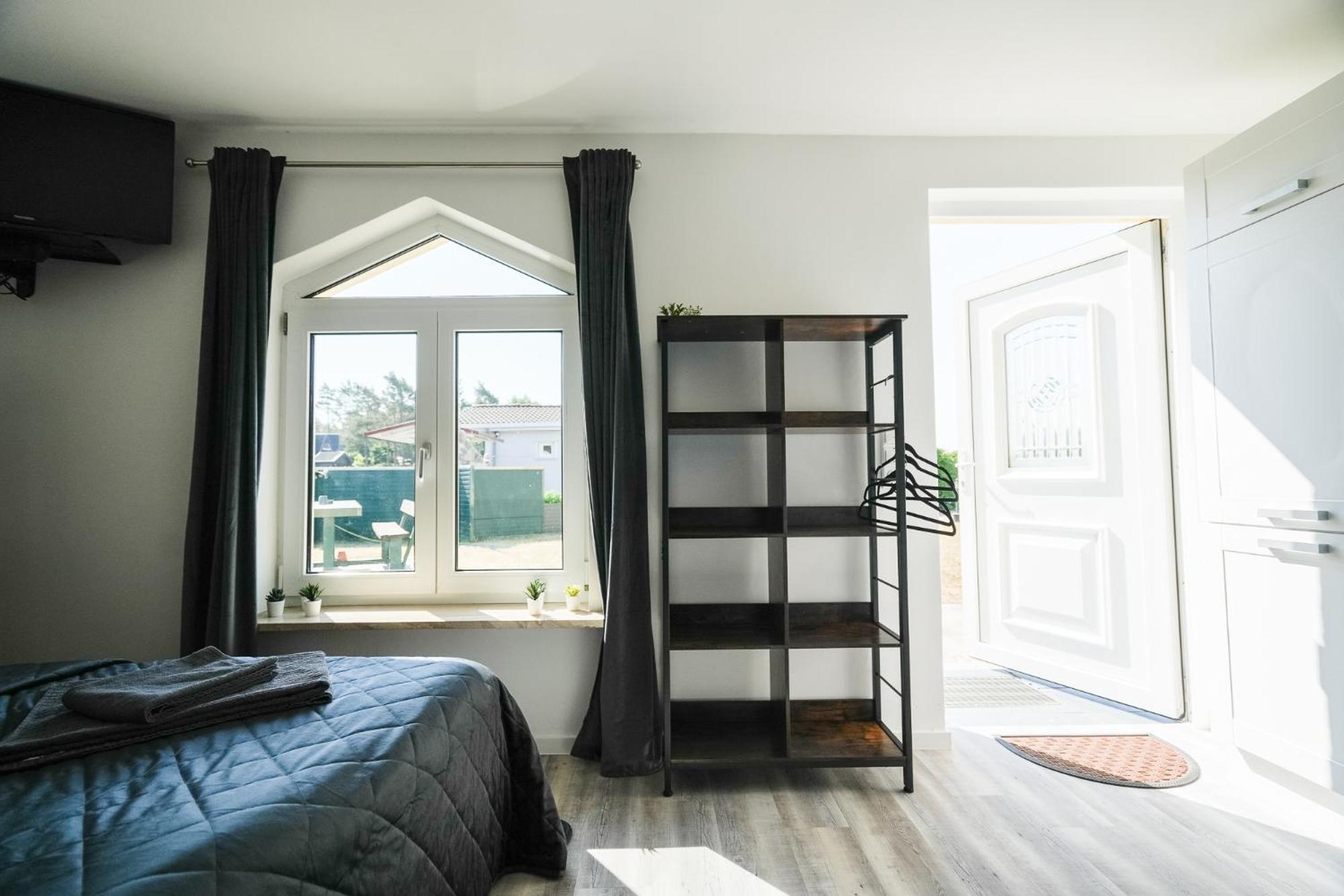 Black Tiger Seaside - Ferienwohnungen Direkt Am See Garden Bilik gambar